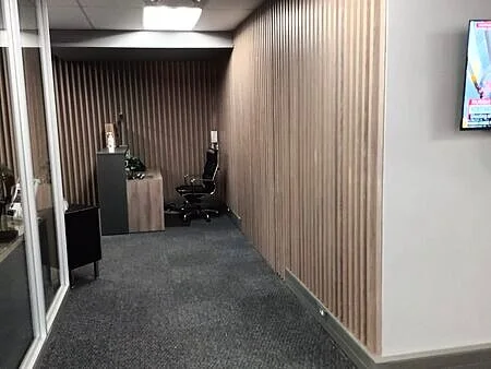Completed reception with stone desk top, Johannesburg commercial interior
