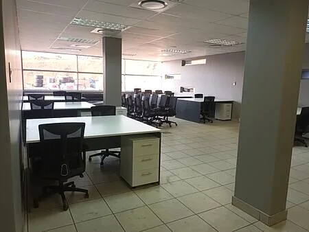 Open-plan work area with commercial desks, Sany Olifantsfontein