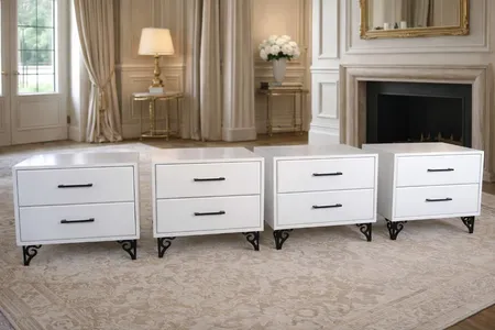Handcrafted white pedestal bedside tables in a bright Johannesburg bedroom — bespoke furniture by Wito Projects